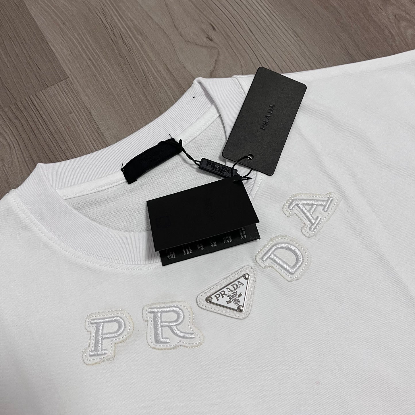 Camiseta OVERSIZE PRADA BORDADA